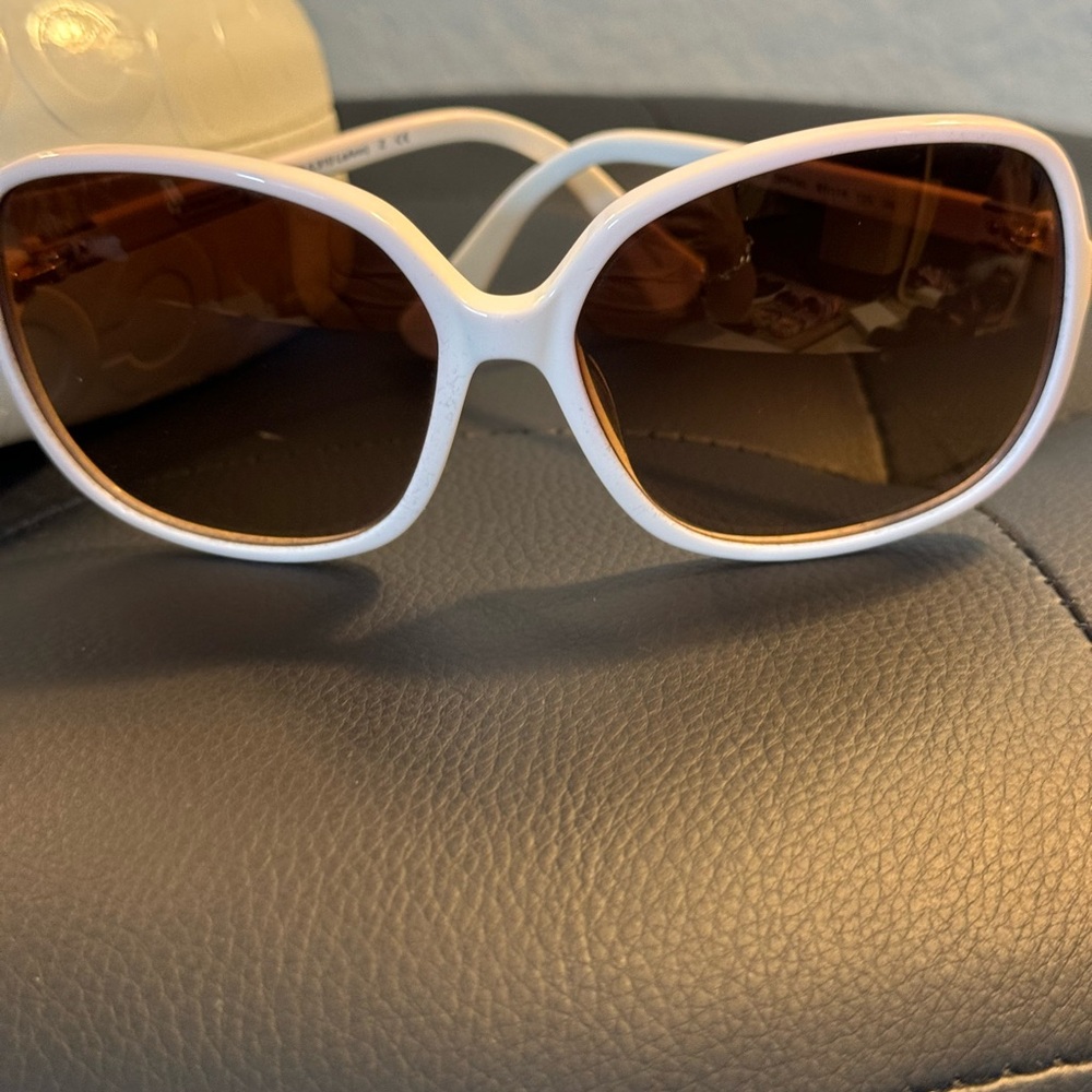 Coach sunglasses and case.  Good condition- no scratches.  Square frames.